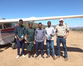 From left: Tumaini, Monica, Yohani, Pasqalu and MAF pilot Mark Liprini at Endanyawish airstrip after the mobile clinic