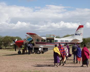 Patient moving toward the plane