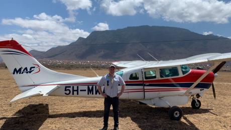 MAF Pilot Jarkko Korhonen posing by the Cessna 206.