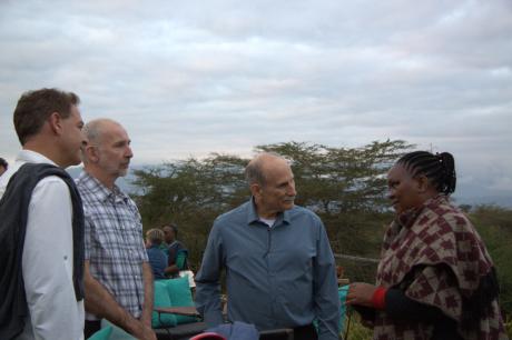 Dave Fyock talking with Clementine Dakay Burra, representative of Haydom Hospital.