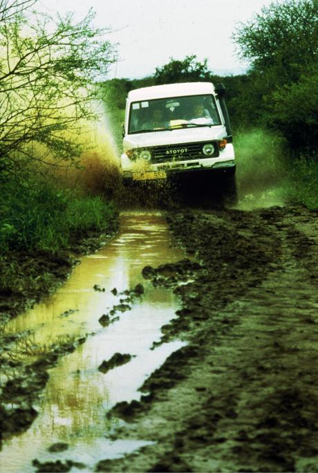 Angelika driving across the muddy roads to reach the isolated communities and set up a medical camp.