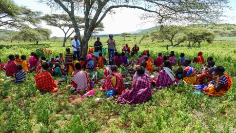 Maasai women are taught more about fistula during a mobile clinic in Olemilei