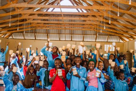 Happy pupils after eating the nutritious porridge