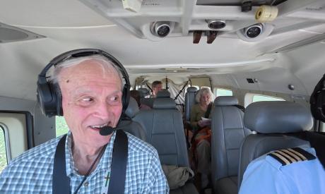 Kurt Ladendorf (in front), Klaus Wagner and Marlies Ladendorf on the flight to Moshi as flooding continued in the Malambo region 