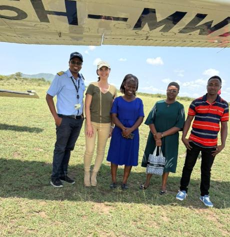 Roshan Stephen and Elsa Klarich under the shade of the wing with staff members from Same hospital
