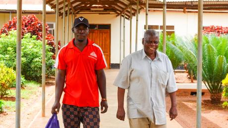 Ernest and Abeli happily going home after surgery