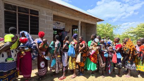 Clinic lines forming in front of the unfinished building